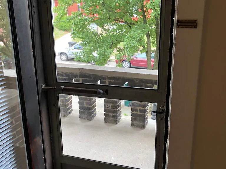 Screened door to porch