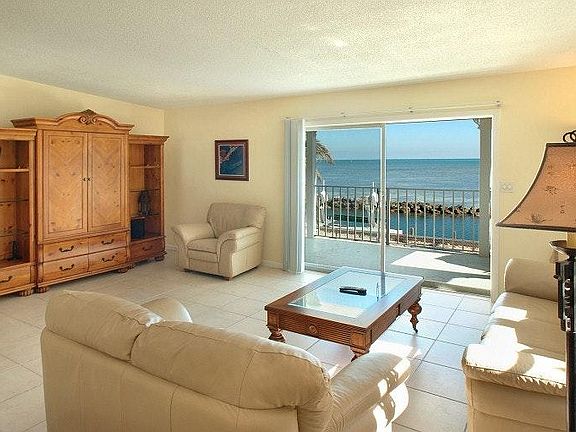 View the ocean from the living room through the 8' sliding doors.