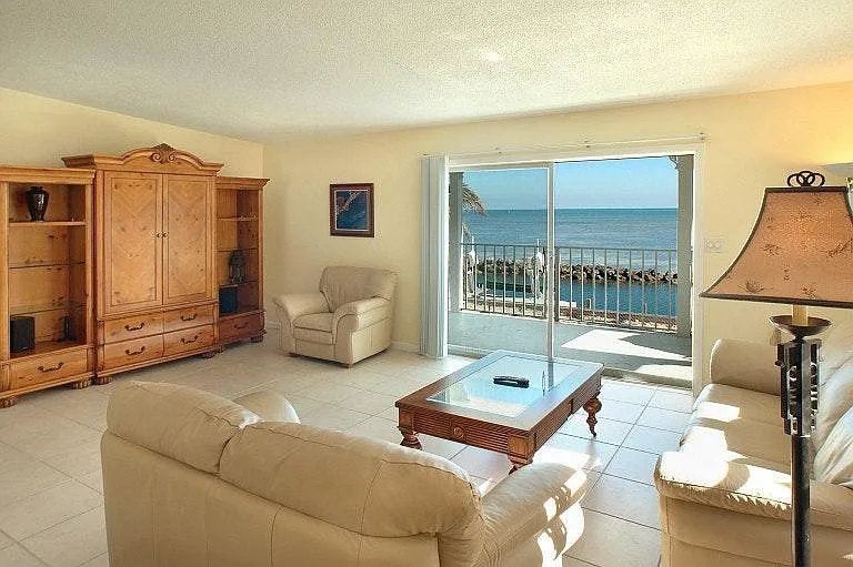 View the ocean from the living room through the 8' sliding doors.