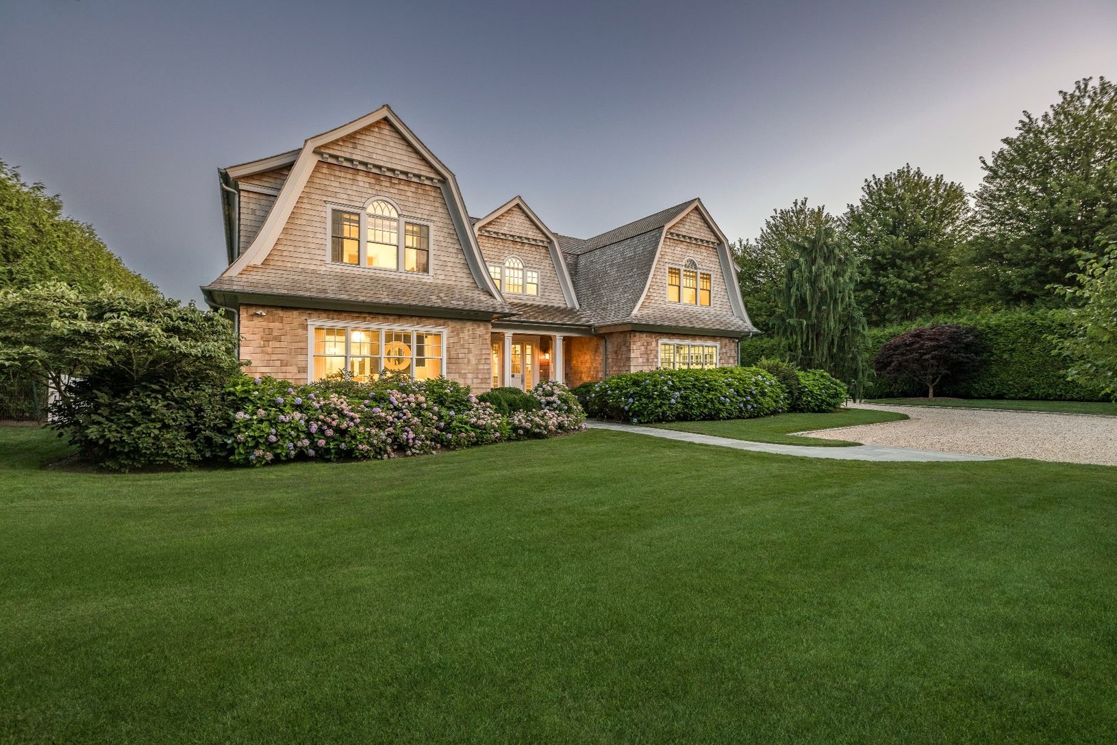 1 Farrell Court glows in the twilight