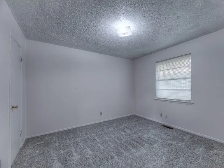 1129 S 124th East Ave — Photo 3