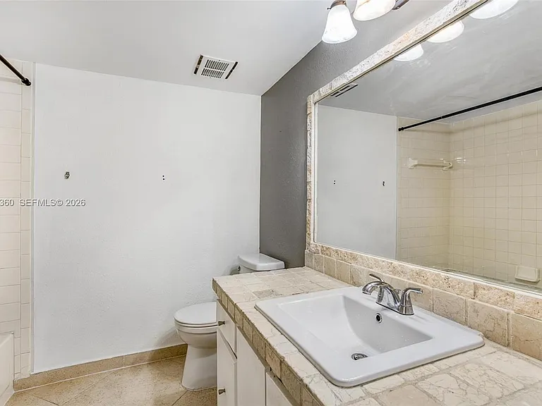 709 Gardens Dr #101 — Photo 17