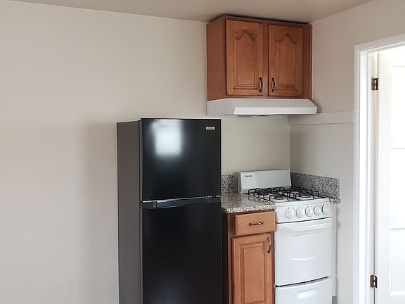 Stove, counter and fridge,exhaust fan