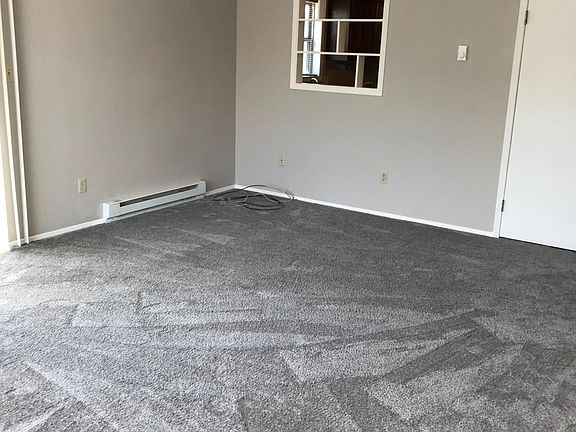 Living room with open area to kitchen