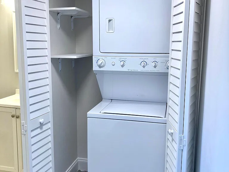 In-unit washer+dryer with convenient storage shelving