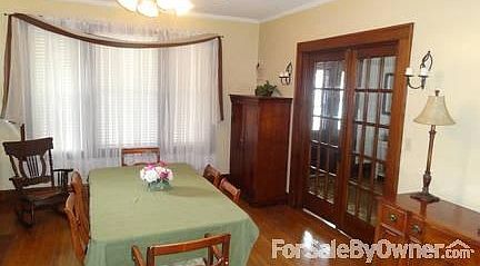 Beautiful Dining Room
						:
						Original hardwood floors, pocket doors, and woodwork