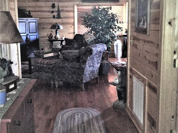 Foyer into Living Area. Bedroom off to your right; Bathroom and W/D rooms off to your left.
