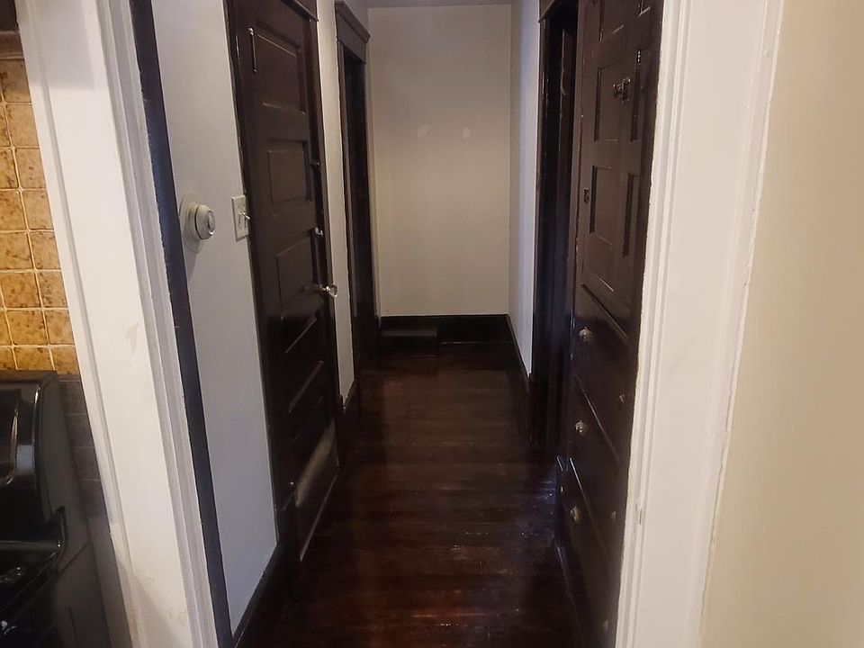 Hallway that connects three rooms