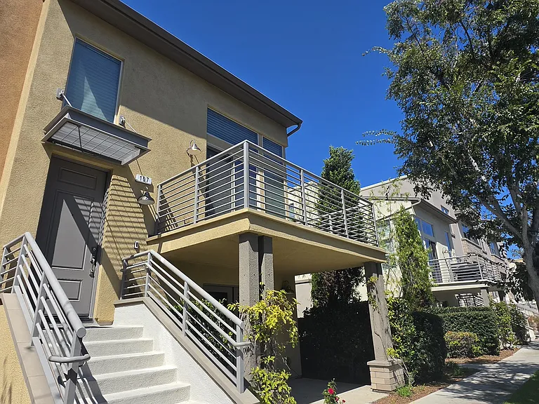 Beautiful curb-appeal, with functional patio and balcony.