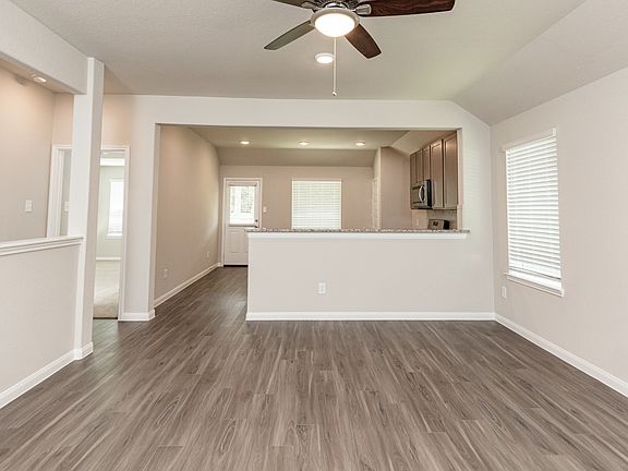 Family Room to Kitchen and Dining Area