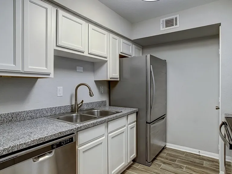 Kitchen w/all stainless steel appliances.