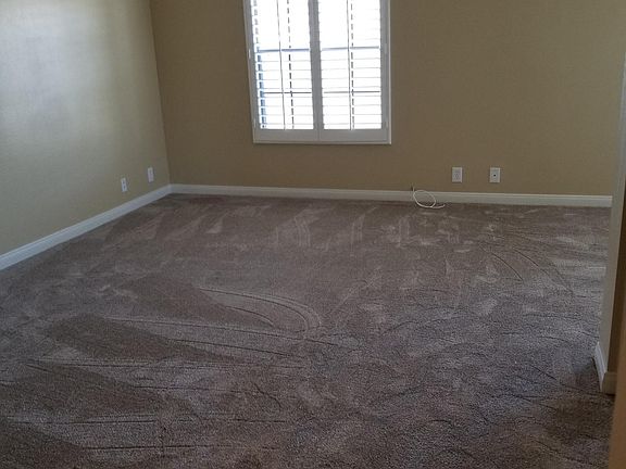 Large spacious Master Bedroom with vaulted high ceilings, brand new upgraded carpet and padding.