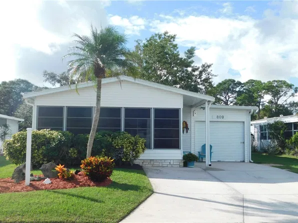 809 Tamarind Cir, Barefoot Bay, FL 32976