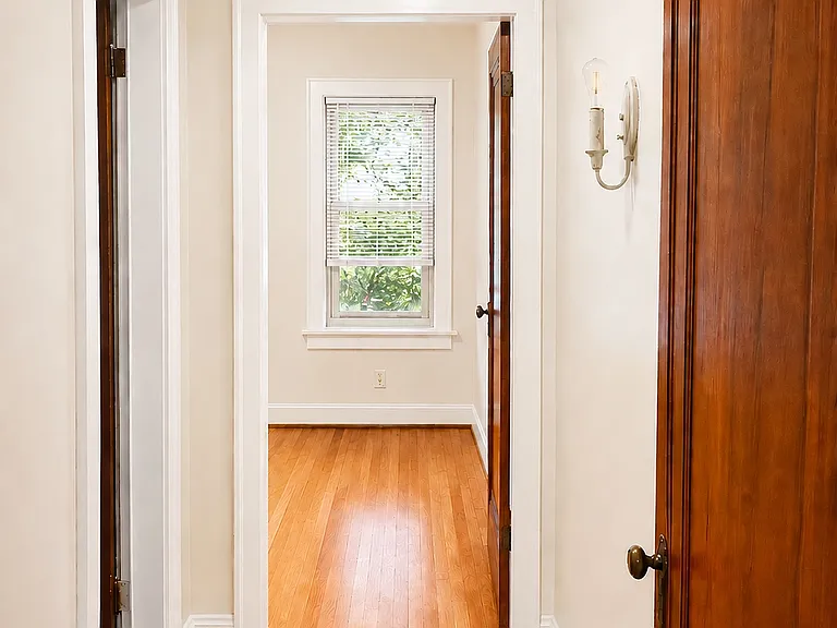 Hallway to bedroom and bathroom