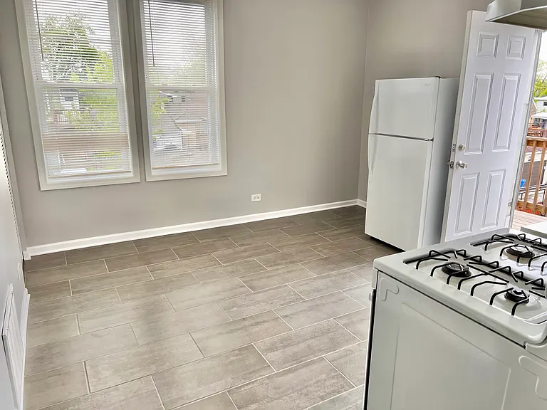 Eating Area in Kitchen with Windows