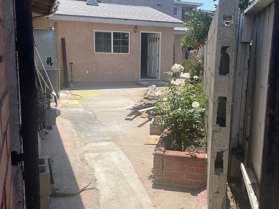 View of home + outdoor space (not shared) from private entrance.