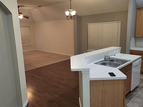 Kitchen Island, Dining Area, and Family Room