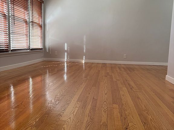 Large living area with beautiful Oak hardwood