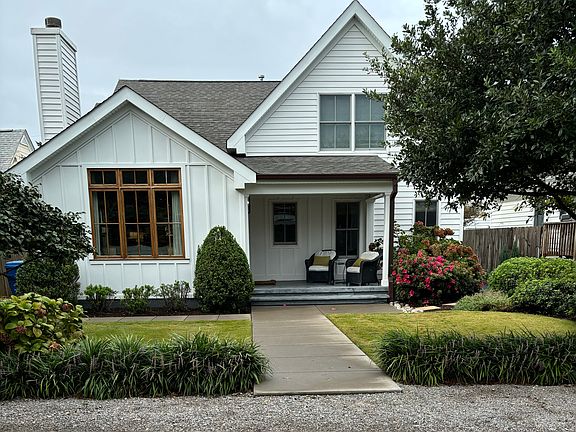 Enjoy Southern exposure and lively neighborhood from front porch