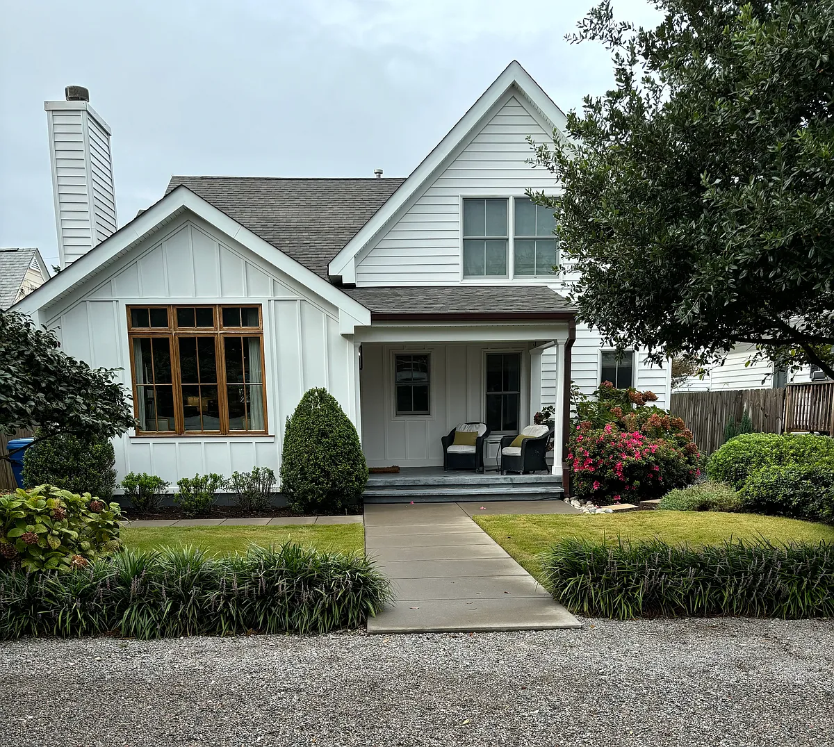 Enjoy Southern exposure and lively neighborhood from front porch - 303 48th St