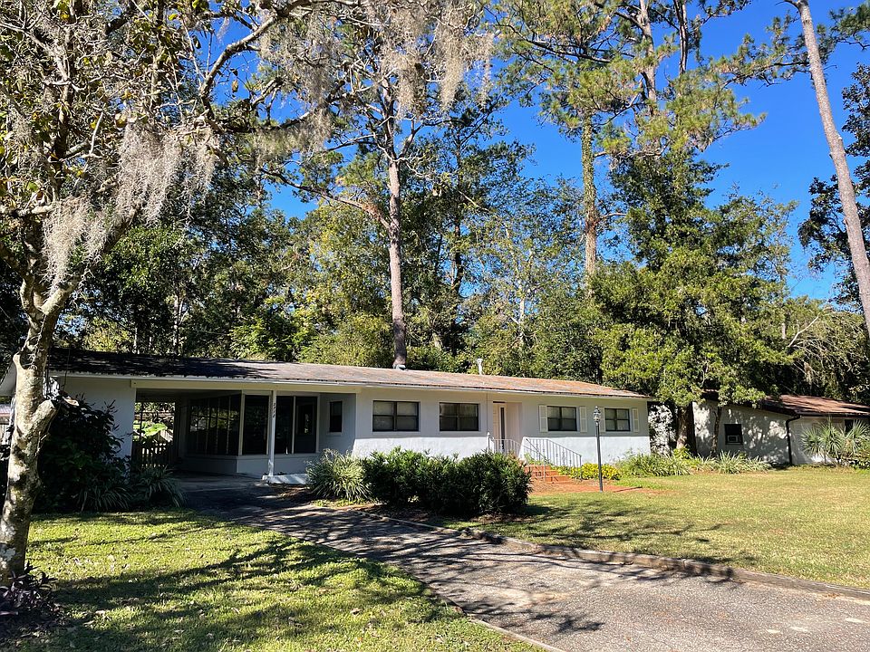Front of house and covered carport