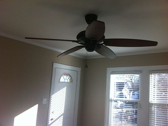 Living room 1, ceiling fan and front door