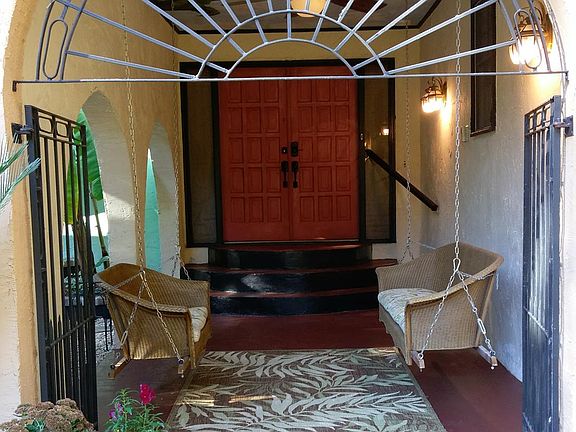 Front entrance Portico with swings