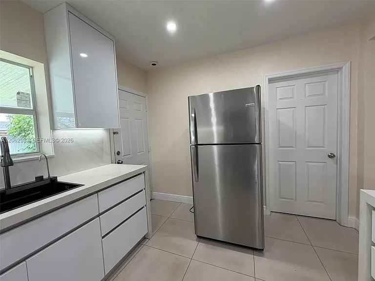 9016 NW 35th Ct — Photo 7