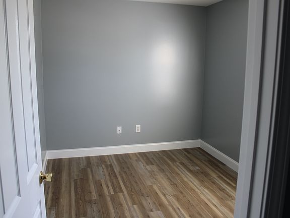 Bedroom with new flooring.