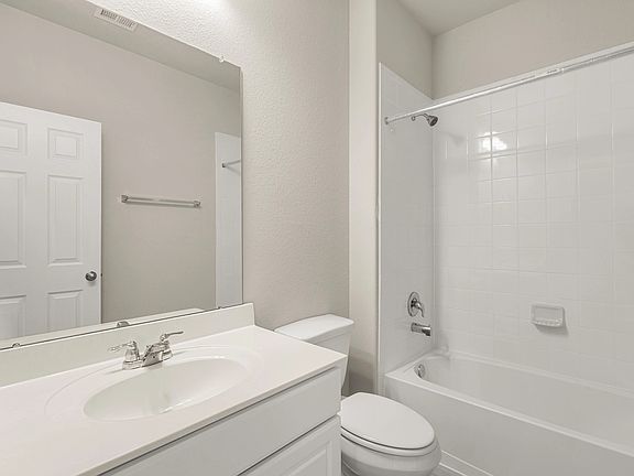 Secondary bath. Note Sample product photo - actual exterior and interior selections may vary by hom