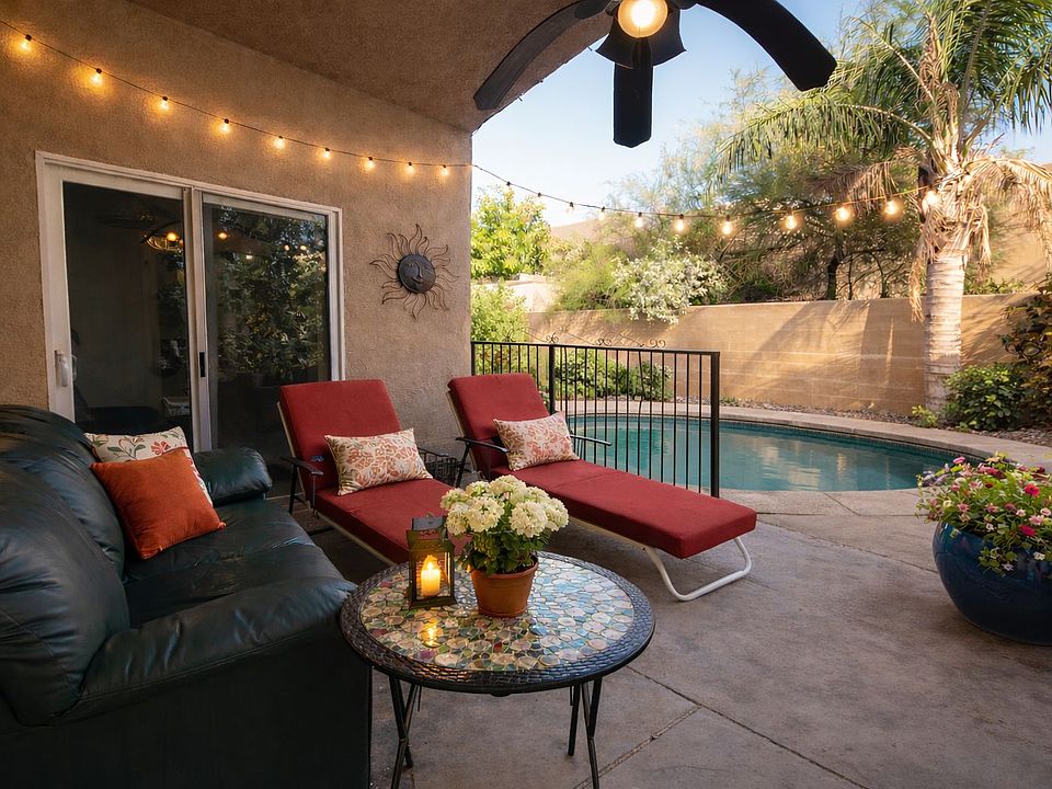 Covered patio with the entrance to the pool