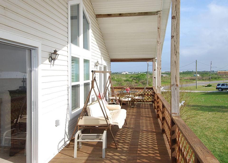  COVERED BACK DECK OVERLOOKING POND