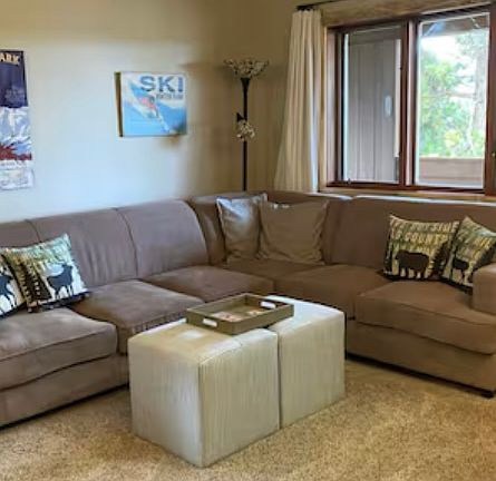 Couch has queen size hide a bed