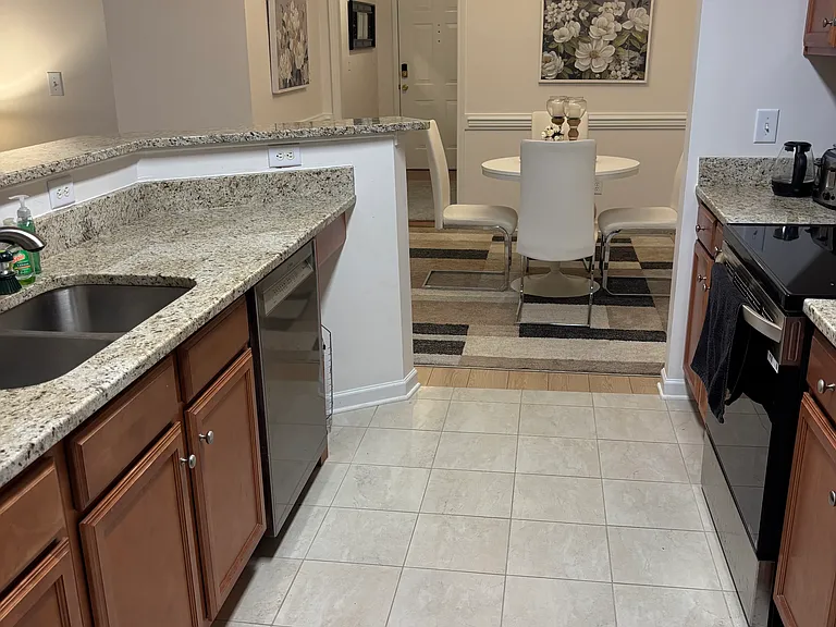 kitchen to dining area/front entrance view