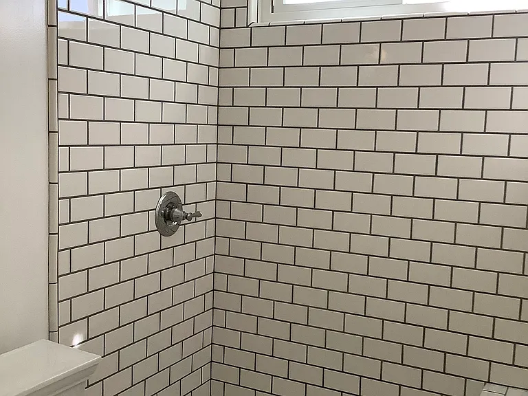 LAREGE NEW TILE SHOWER W/ BENCH