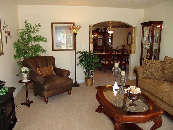 Formal front room off entry, leading into dining room.
