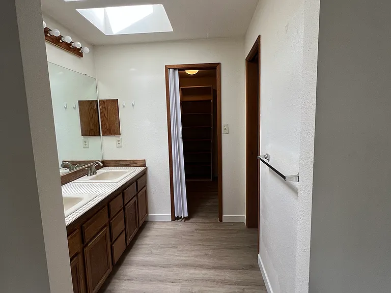 New Skylights, master bathroom, to walk in closet and toilet in the right