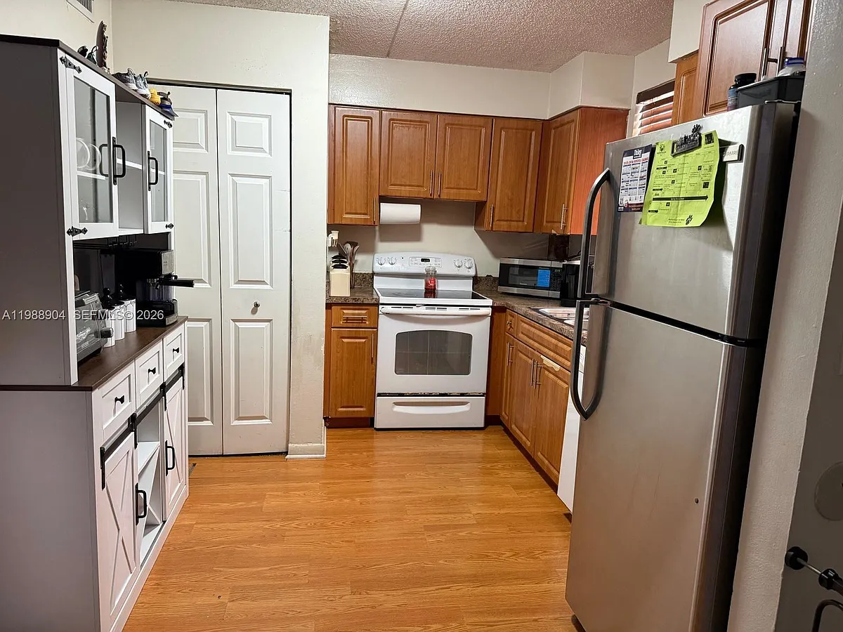 Building Photo - 6195 NW 186th St #211