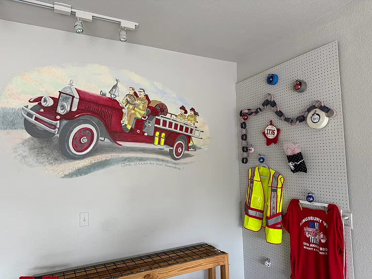 PEG BOARD IN GARAGE TO HANG YOUR TOOLS.