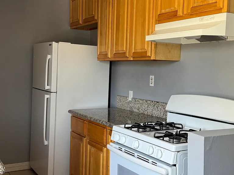 Kitchen with refrigeator
