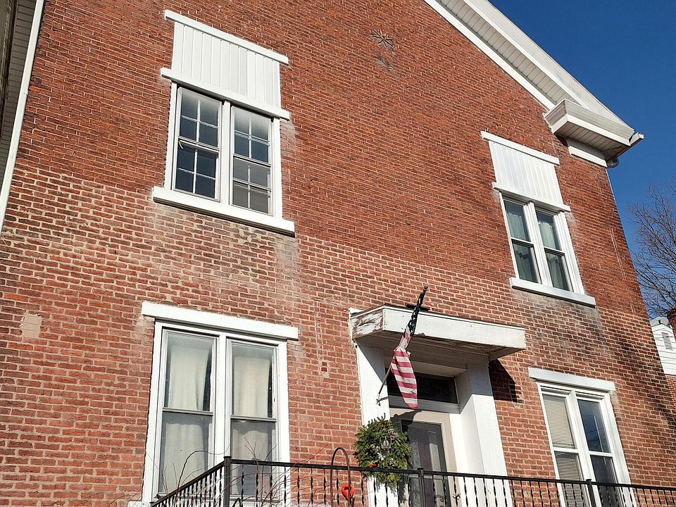 1st image of 113 E 1st St