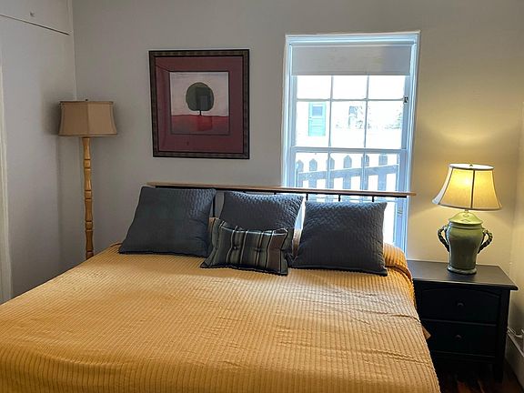Master bedroom with king size bed.