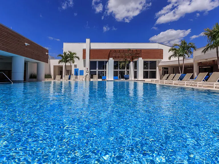 Dive into the sunshine and enjoy plenty of space to relax and swim in the spacious, sun-filled pool.