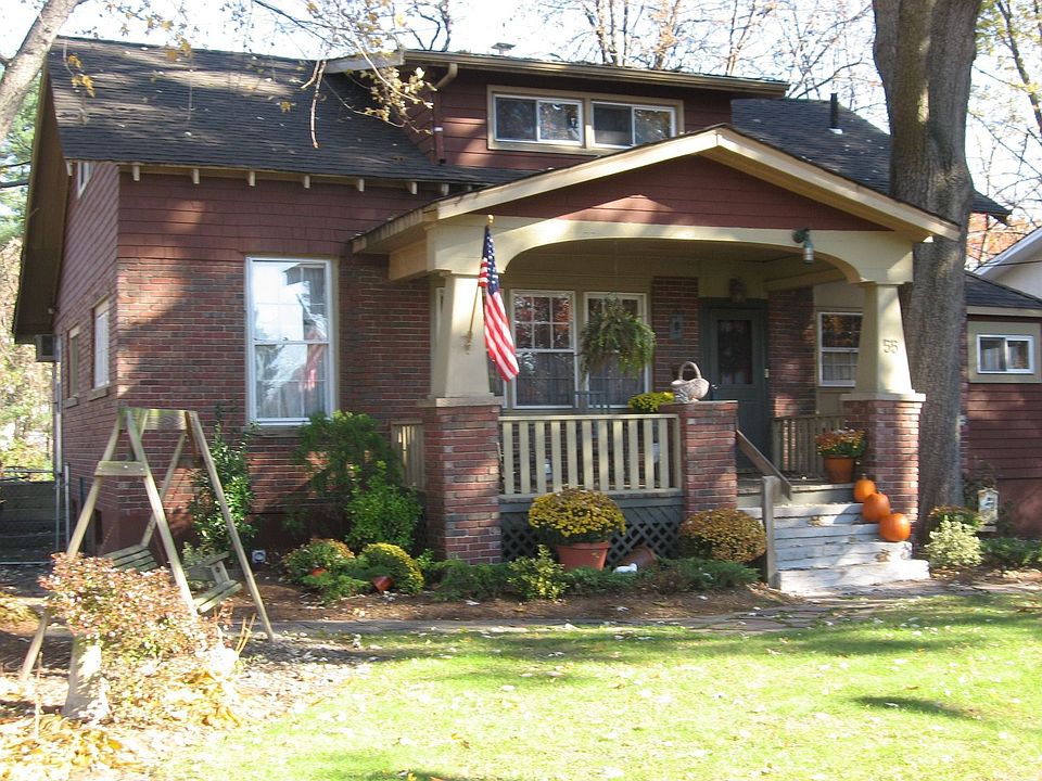 Beautiful brick Craftsman with Rocking Chair Porch!