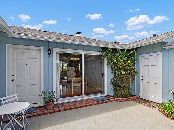Inner courtyard leads into home or into the attached garage.