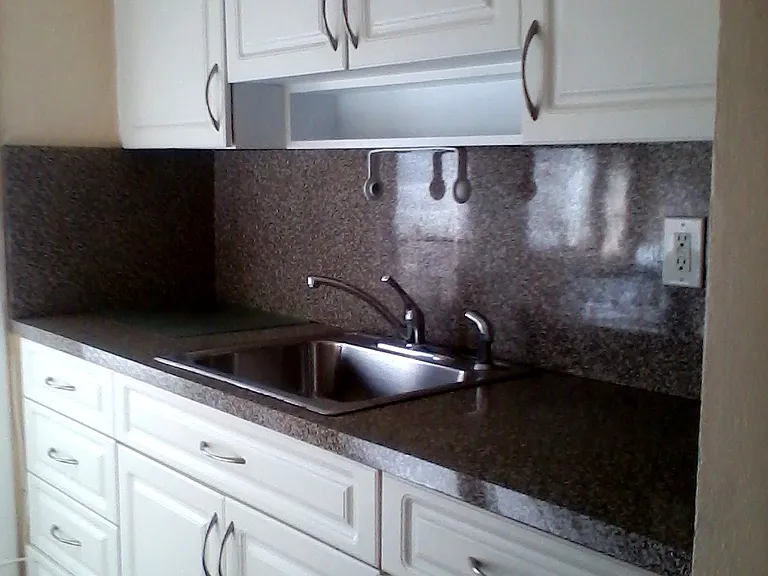 More traditional kitchen (my style) & some modern look. Solid wood, a rarity now in the age of synthetic goods !