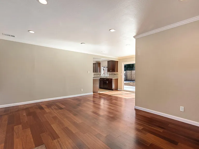 Living room looking toward dining room and kitchen
