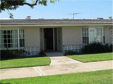 Covered entry. Note: newer bay windows in living room and master