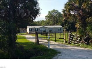 1066 Sanctuary Rd, Naples, FL 34120