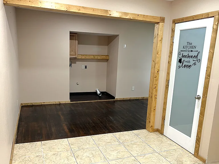 Large pantry (right), washer and dryer in the home (center), dining room (left)